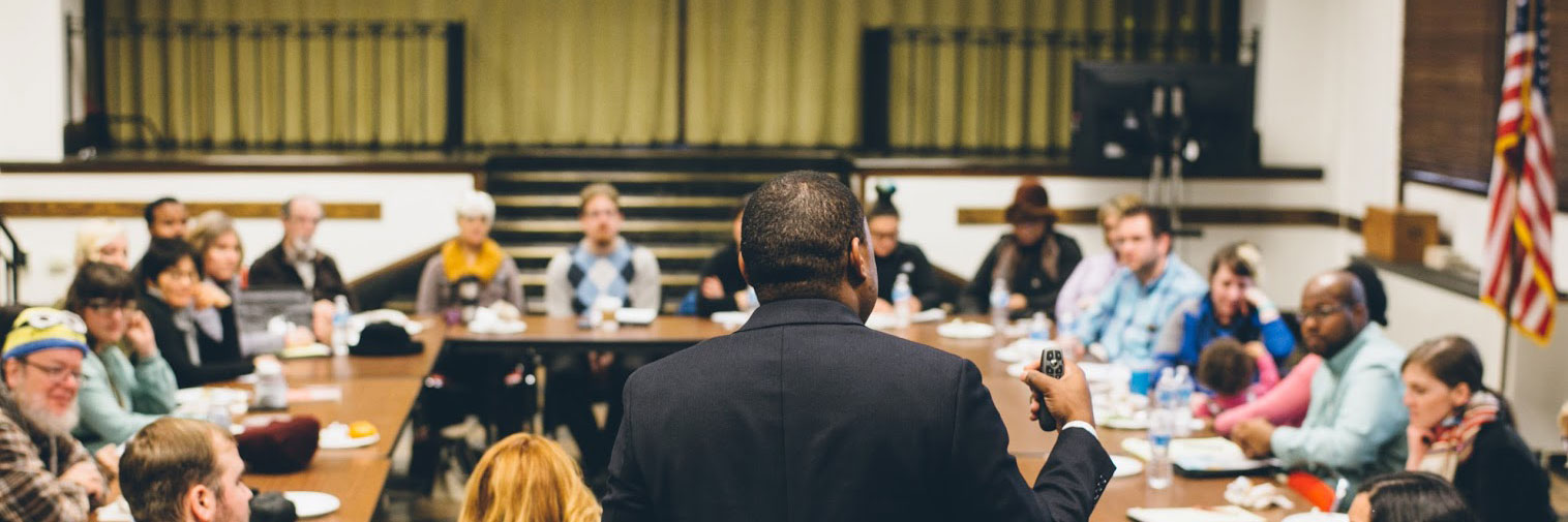 A person speaking to a group.